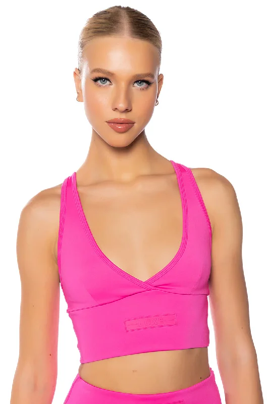 women's tops for those who want to make a fashion statementITS THE PAXTON LUXE LONGLINE BRALETTE IN NEON PINK