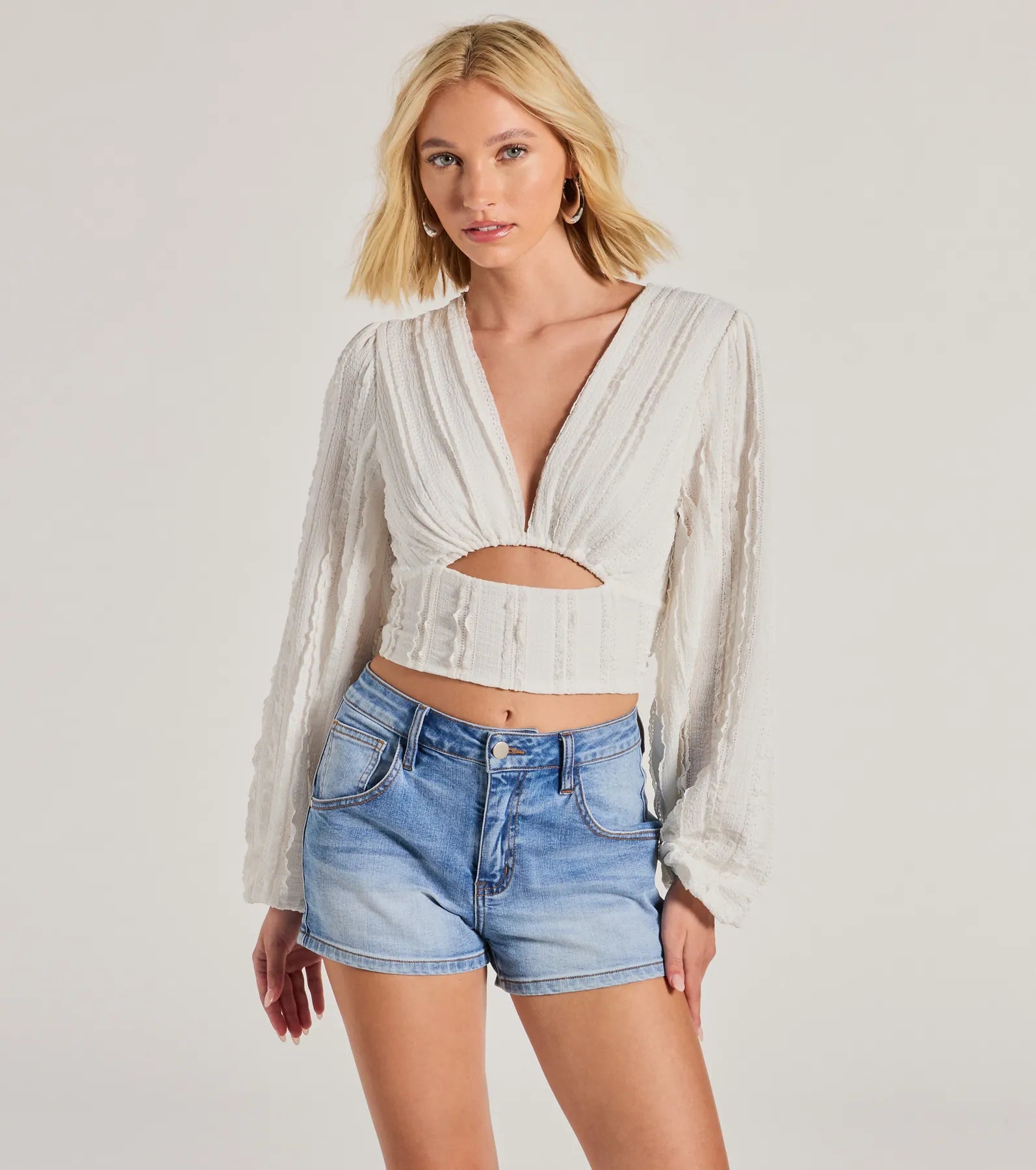 women's tops for those who want to stay on top of the latest fashion trends and wear pieces that are both stylish and on-trendRomance Awaits Long Sleeve Ruffle Lace Trim Crop Top